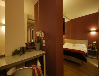 Camera Quadrupla Superior